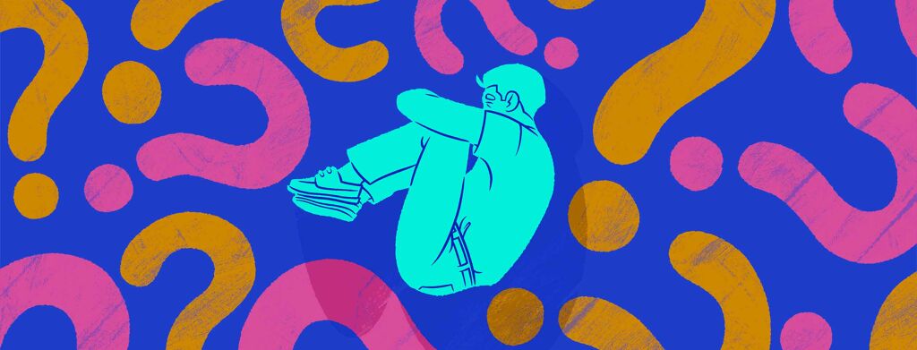 A man lays in the fetal position as question marks float around him
